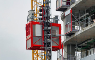 elevator-lifts-for-workers-and-material-at-the-construction-site___3321c989-c47c-4f2f-9d9c-548e5cd3be9b_converted