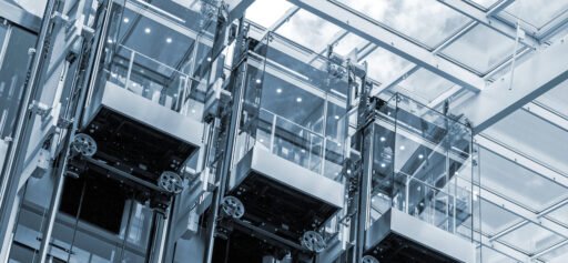 Three modern lift elevators in a contemporary business center
